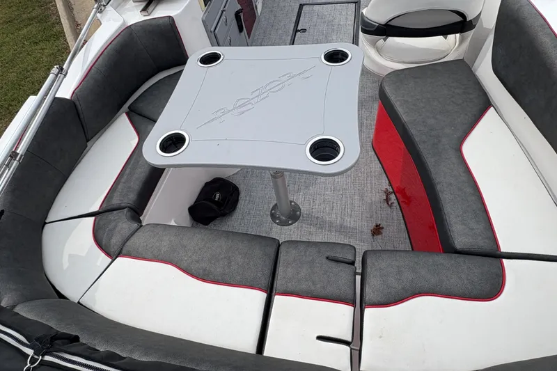 Slide: The Image of Interior of 2017 Razor 238 PF XL boat with seating and table. - 8
