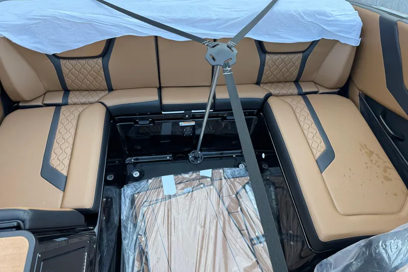 Slide: The Image of 2026 Yamaha Boats 255XD interior with tan leather seating and modern design. - 5