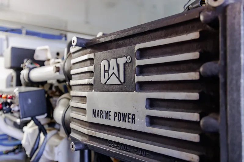 Slide: The Image of CAT Marine Power engine in a 2005 Hatteras 50 Convertible yacht. - 103