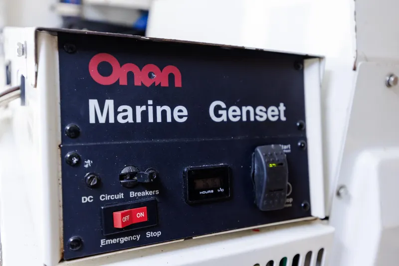 Slide: The Image of Onan Marine Genset on 2005 Hatteras 50 Convertible yacht. - 104