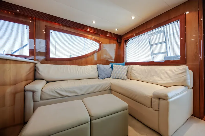 Slide: The Image of Luxurious interior of 2005 Hatteras 50 Convertible yacht with cream leather seating. - 18