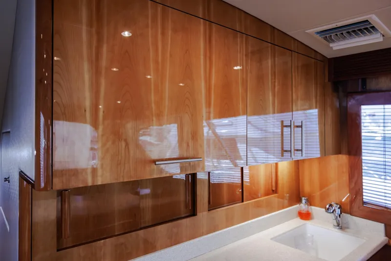 Slide: The Image of Luxurious wooden cabinetry in 2005 Hatteras 50 Convertible yacht interior. - 22