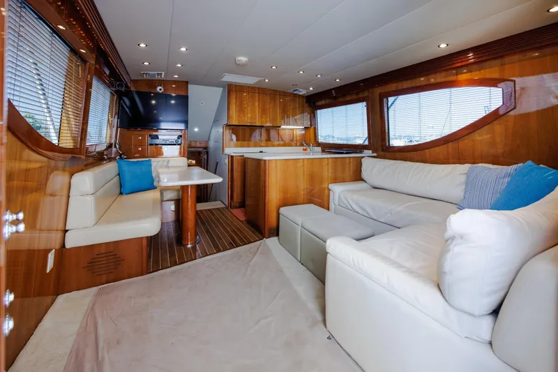 Slide: The Image of Luxurious interior of 2005 Hatteras 50 Convertible yacht with plush seating and modern amenities. - 3
