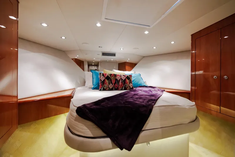 Slide: The Image of Luxurious cabin interior of 2005 Hatteras 50 Convertible yacht with elegant bedding. - 37