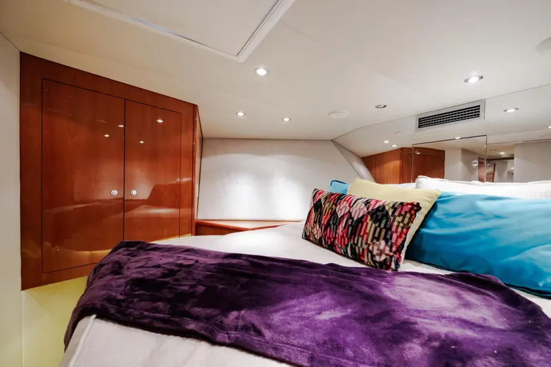 Slide: The Image of Luxurious cabin interior of 2005 Hatteras 50 Convertible yacht with colorful bedding. - 38