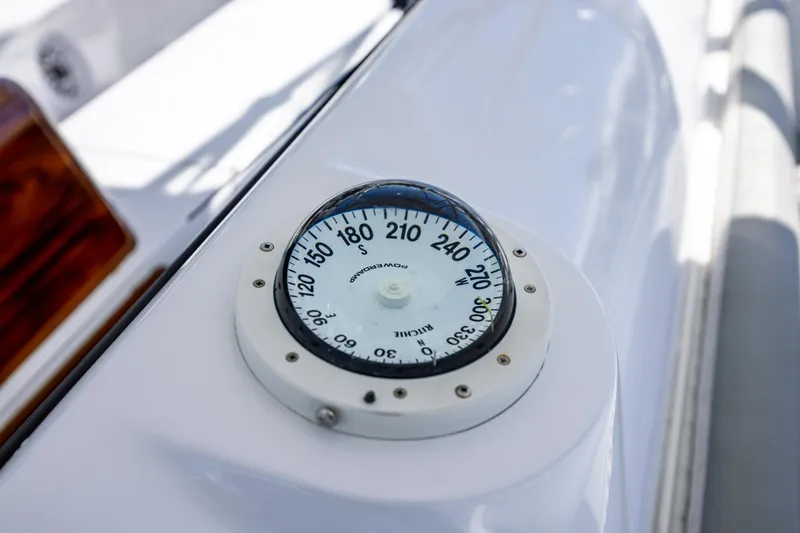 Slide: The Image of Compass on 2005 Hatteras 50 Convertible yacht, showing navigation details. - 53