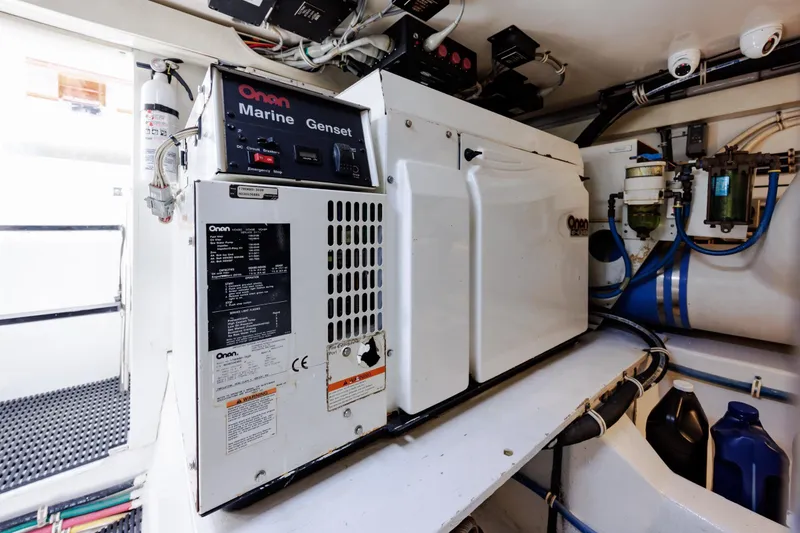 Slide: The Image of Engine room of 2005 Hatteras 50 Convertible with Onan Marine Genset. - 96