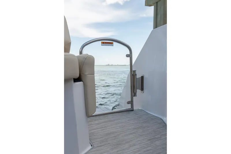Slide: The Image of 2026 Regal 26 XO boat interior with white leather seating and modern design. - 5