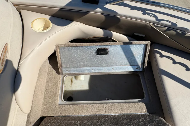 Slide: The Image of Open storage compartment on 2001 Crestliner 1900 PHANTOM SST boat interior. - 12