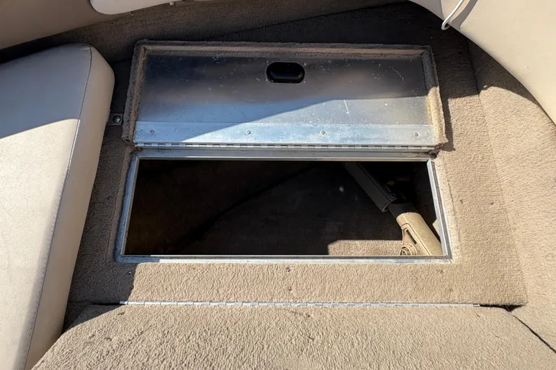 Slide: The Image of Open storage compartment in 2001 Crestliner 1900 PHANTOM SST boat interior. - 14