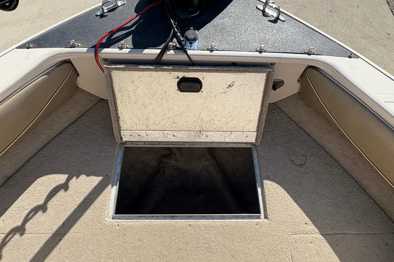 Slide: The Image of Open storage compartment on 2001 Crestliner 1900 PHANTOM SST boat deck. - 16