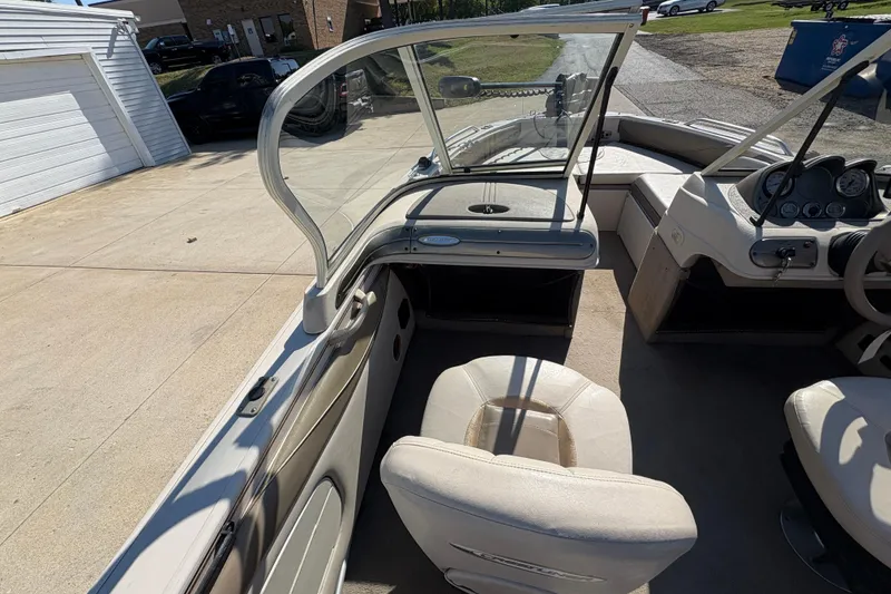 Slide: The Image of Interior view of 2001 Crestliner 1900 PHANTOM SST boat with seating and dashboard. - 19