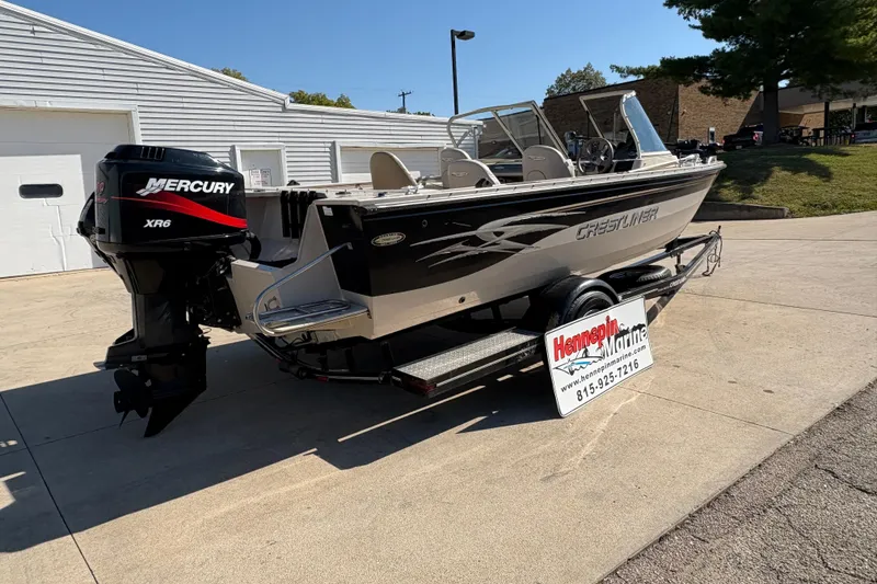 Slide: The Image of 2001 Crestliner 1900 PHANTOM SST boat with Mercury XR6 engine on trailer. - 2