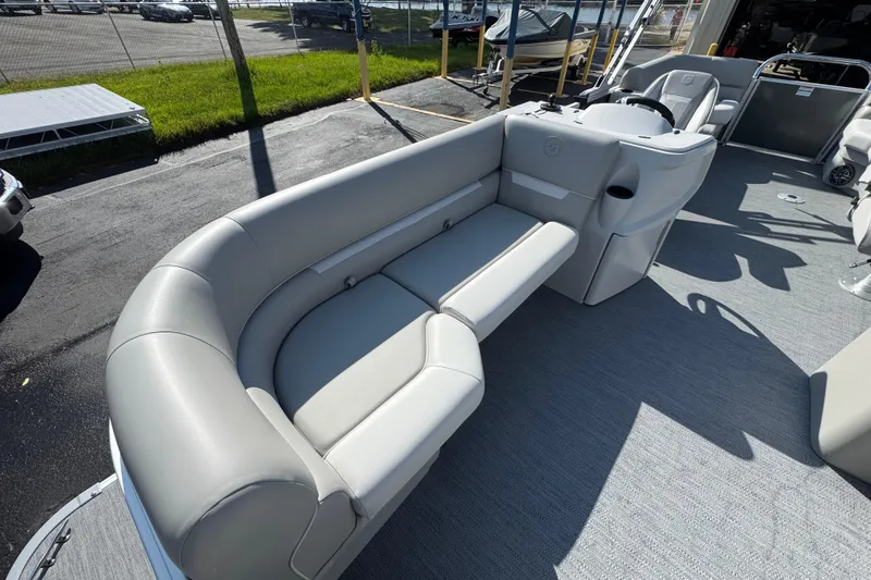 Slide: The Image of 2026 Sweetwater EX2286SBX pontoon boat with spacious seating and modern design. - 6