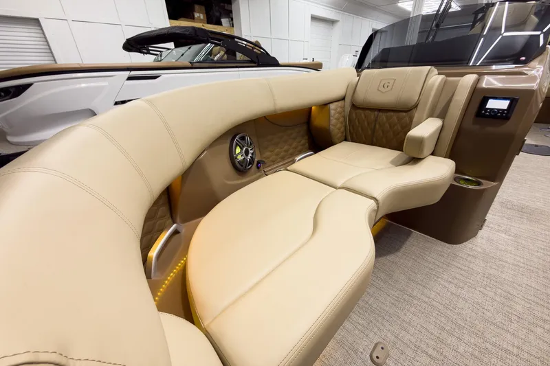 Slide: The Image of Luxurious interior of 2026 Godfrey Sanpan 23' Ultra Lounge Tritoon with plush seating. - 13