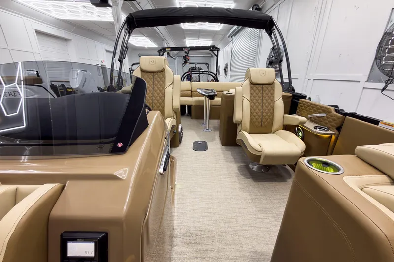 Slide: The Image of Luxurious interior of 2026 Godfrey Sanpan 23' Ultra Lounge Tritoon, featuring plush seating and modern design. - 16