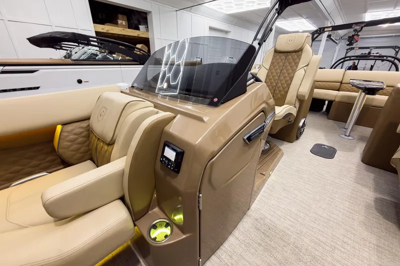 Slide: The Image of Luxurious interior of 2026 Godfrey Sanpan 23' Ultra Lounge Tritoon with plush seating and modern design. - 17