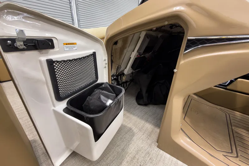 Slide: The Image of Interior storage compartment of 2026 Godfrey Sanpan 23' Ultra Lounge Tritoon boat. - 28