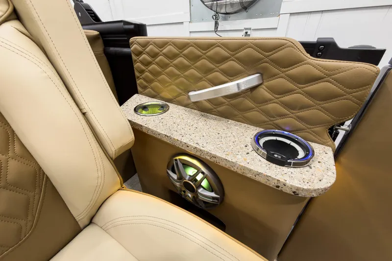 Slide: The Image of Luxurious interior of 2026 Godfrey Sanpan 23' Ultra Lounge Tritoon with cup holders and speaker. - 31
