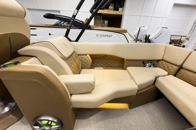 Slide: The Image of Luxurious interior of 2026 Godfrey Sanpan 23' Ultra Lounge Tritoon with plush seating. - 35