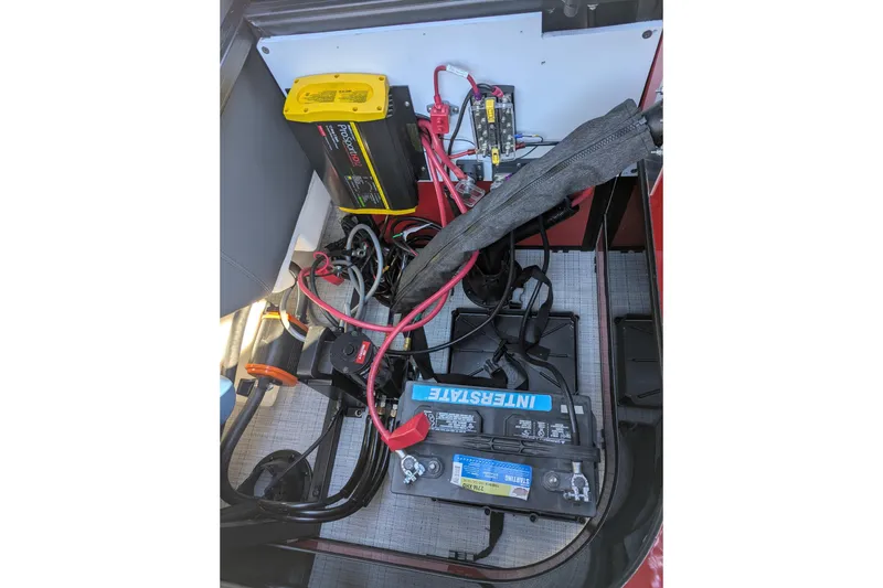 Slide: The Image of 2026 Trifecta 21C SS battery compartment with wiring and components. - 17