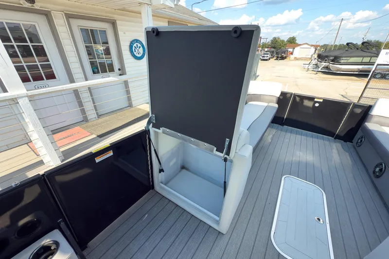 Slide: The Image of 2024 Godfrey Sweetwater 22' pontoon boat interior with split bench and storage compartment. - 21