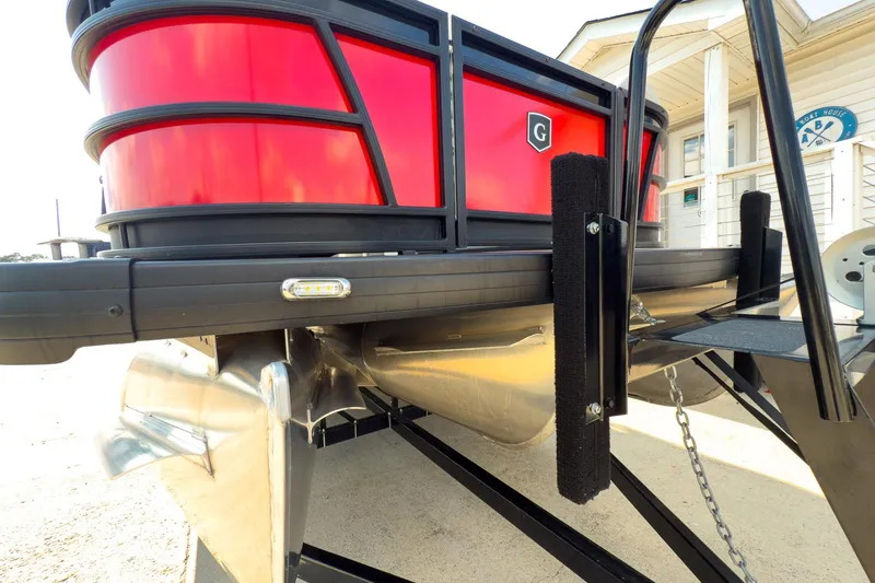 Slide: The Image of 2024 Godfrey Sweetwater 22' pontoon boat, red exterior, Mercury 400 V10 engine, docked. - 27