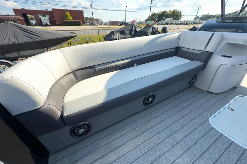 Slide: The Image of 2024 Godfrey Sweetwater 22' boat interior with plush seating and modern design. - 4