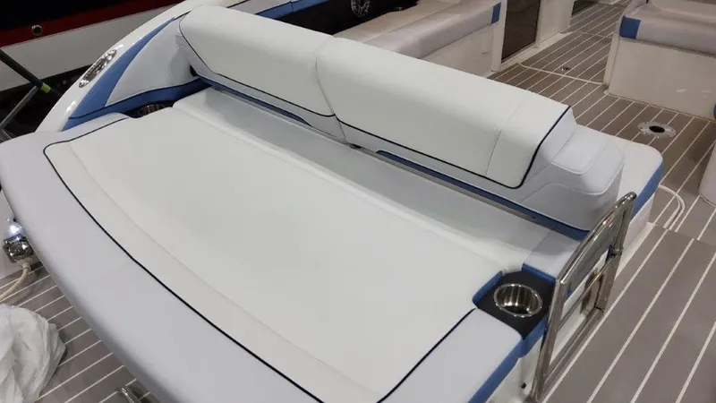 Slide: The Image of 2025 Formula 330 Crossover Bowrider OB, luxurious seating with cup holders on deck. - 19