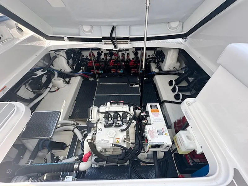 Slide: The Image of Engine compartment of 2025 Formula 330 Crossover Bowrider OB, showcasing mechanical components. - 22