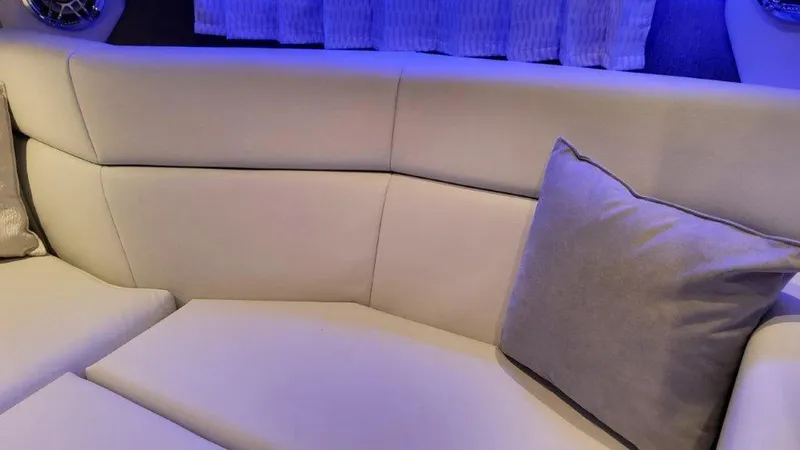 Slide: The Image of Luxurious seating in 2025 Formula 330 Crossover Bowrider OB with ambient lighting. - 6