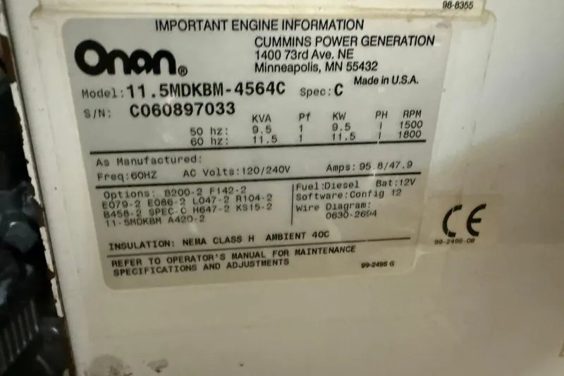 Slide: The Image of Label on Cummins Onan generator, model 11.5MDKBM-4564C, for 2006 Sea Ray 48 Sundancer. - 104