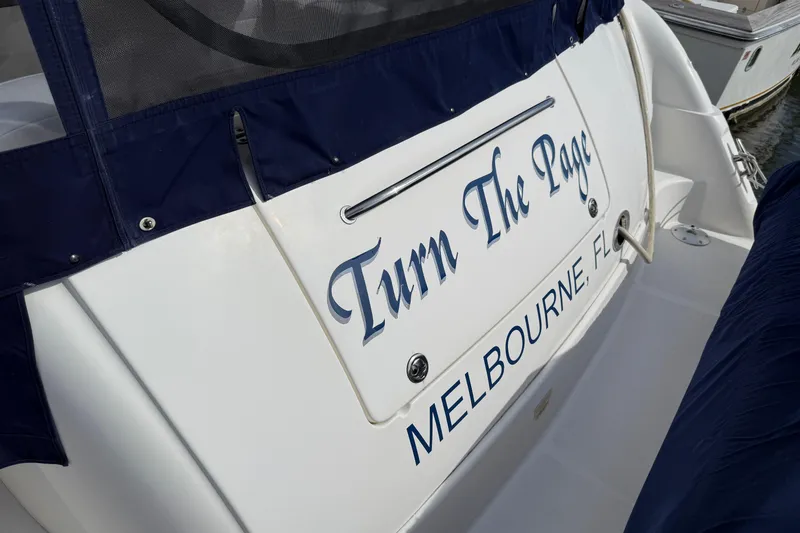 Slide: The Image of 2006 Sea Ray 48 Sundancer boat named "Turn The Page" in Melbourne, Florida. - 107