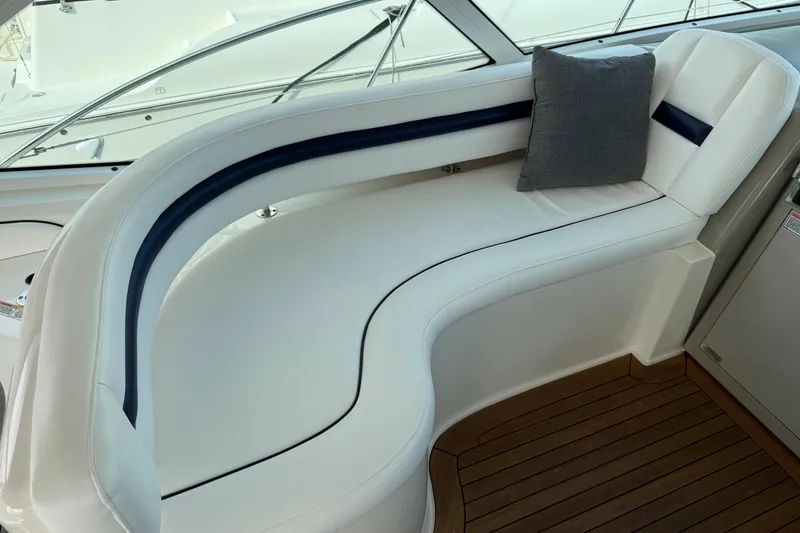 Slide: The Image of Luxurious seating area on 2006 Sea Ray 48 Sundancer yacht with elegant white upholstery. - 20