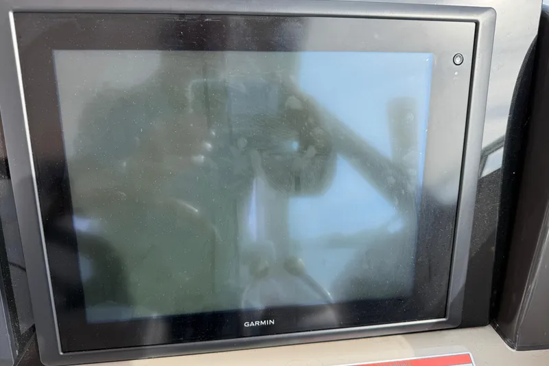 Slide: The Image of Garmin display screen on 2006 Sea Ray 48 Sundancer yacht dashboard. - 30