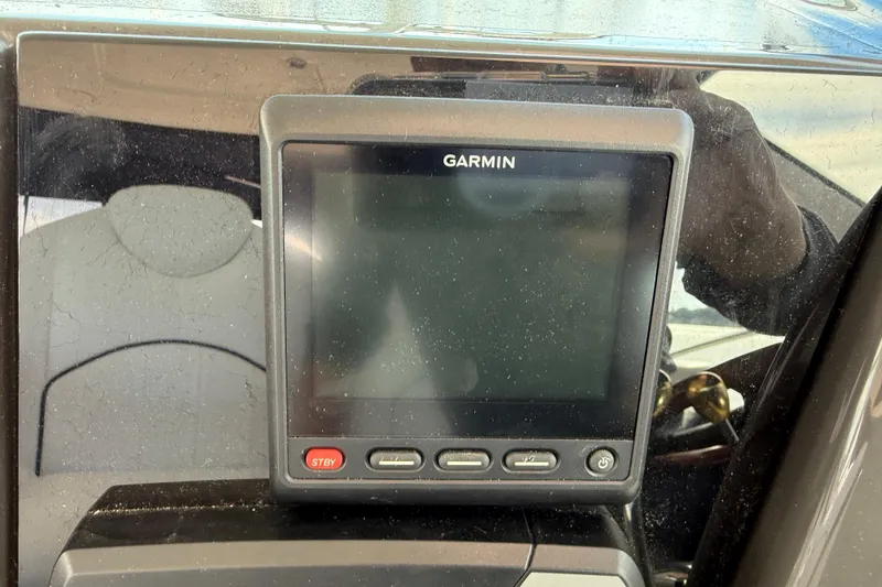 Slide: The Image of Garmin display on 2006 Sea Ray 48 Sundancer yacht dashboard. - 32