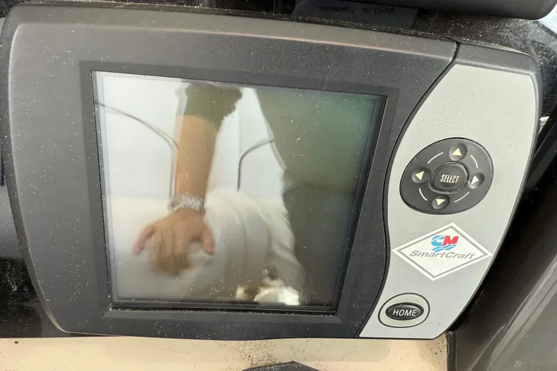 Slide: The Image of SmartCraft display on 2006 Sea Ray 48 Sundancer boat, showing control interface. - 33