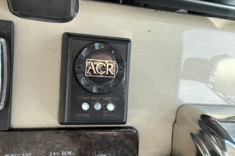 Slide: The Image of ACR control panel on 2006 Sea Ray 48 Sundancer yacht dashboard. - 35