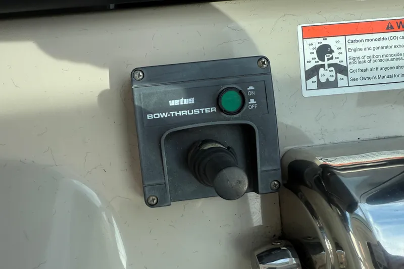 Slide: The Image of Vetus bow thruster control on 2006 Sea Ray 48 Sundancer boat dashboard. - 37