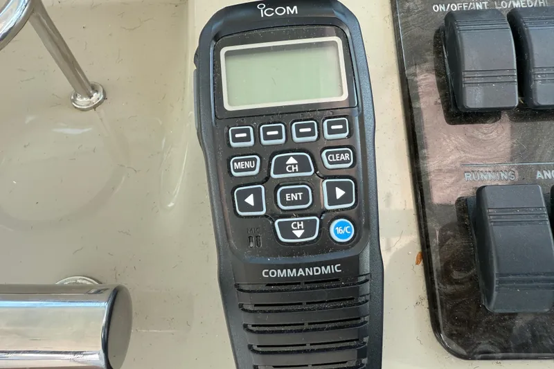 Slide: The Image of ICOM CommandMic on 2006 Sea Ray 48 Sundancer yacht control panel. - 38