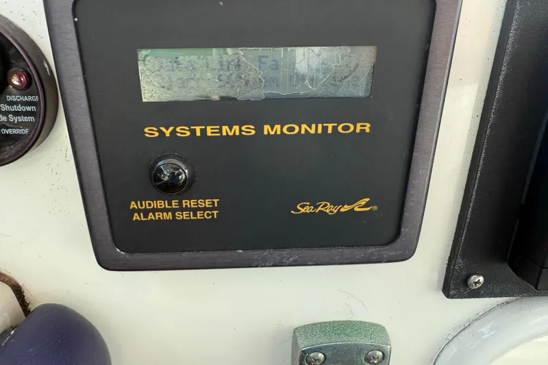 Slide: The Image of Sea Ray 48 Sundancer 2006 systems monitor panel with alarm reset feature. - 39