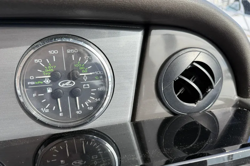 Slide: The Image of Dashboard gauge and vent of 2006 Sea Ray 48 Sundancer boat. - 43
