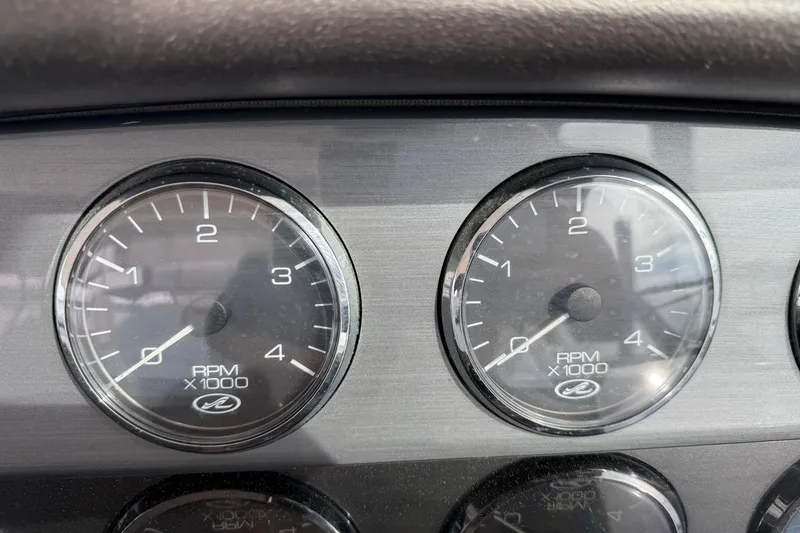 Slide: The Image of Close-up of RPM gauges on a 2006 Sea Ray 48 Sundancer boat dashboard. - 44