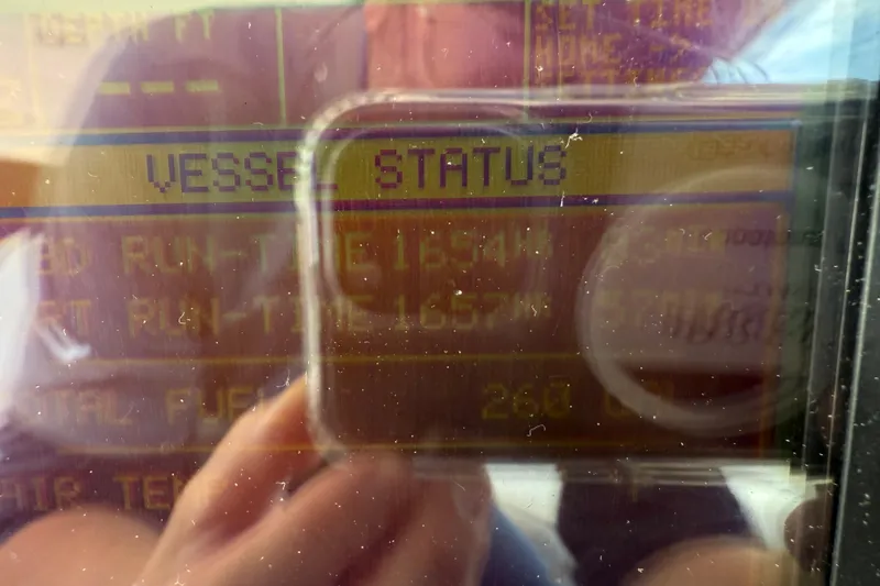 Slide: The Image of Display screen showing vessel status on a 2006 Sea Ray 48 Sundancer yacht. - 46