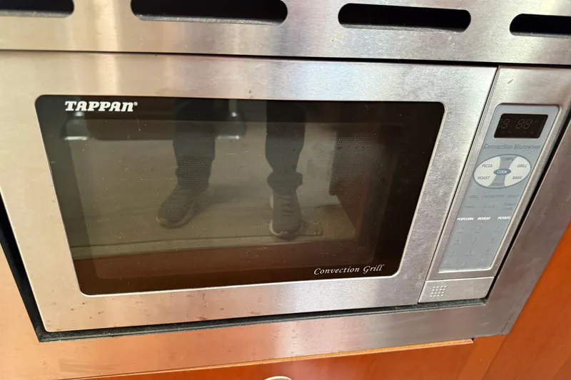 Slide: The Image of Tappan convection grill microwave in 2006 Sea Ray 48 Sundancer yacht kitchen. - 63