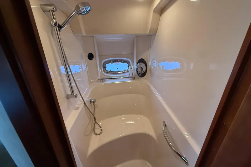 Slide: The Image of Luxurious shower area in 2006 Sea Ray 48 Sundancer yacht with modern fixtures. - 75
