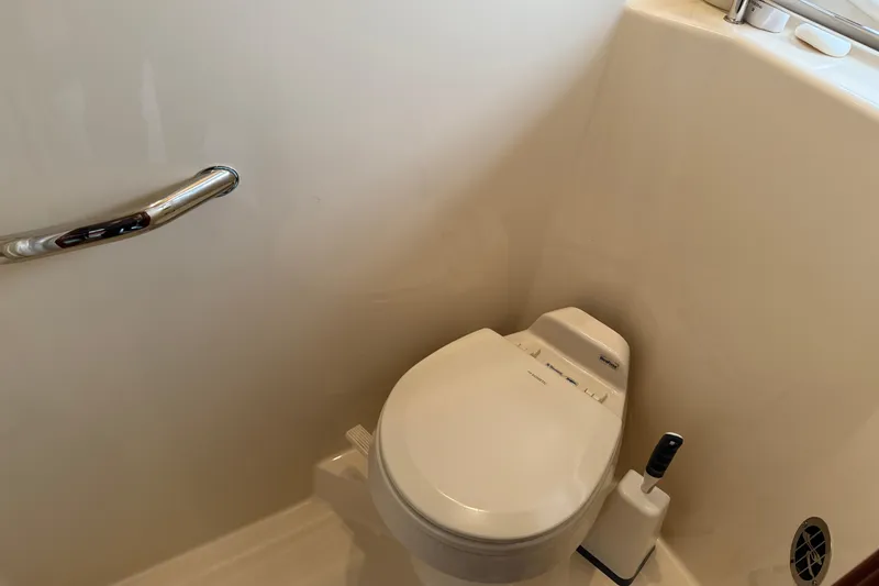 Slide: The Image of Luxury yacht bathroom with modern toilet, Sea Ray 48 Sundancer 2006 model. - 85