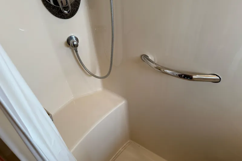 Slide: The Image of Shower area in 2006 Sea Ray 48 Sundancer yacht with chrome fixtures. - 86