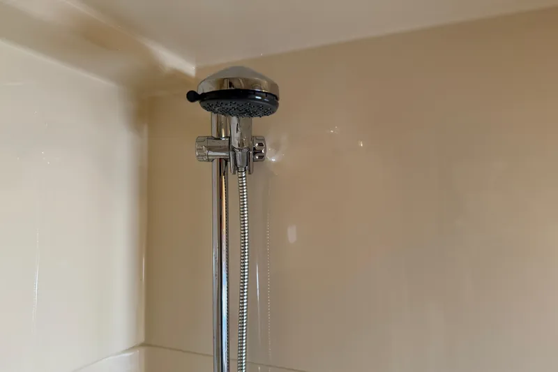 Slide: The Image of Showerhead in 2006 Sea Ray 48 Sundancer yacht bathroom, chrome finish. - 87