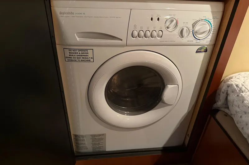 Slide: The Image of Splendide 2000 S washer-dryer in 2006 Sea Ray 48 Sundancer yacht interior. - 88